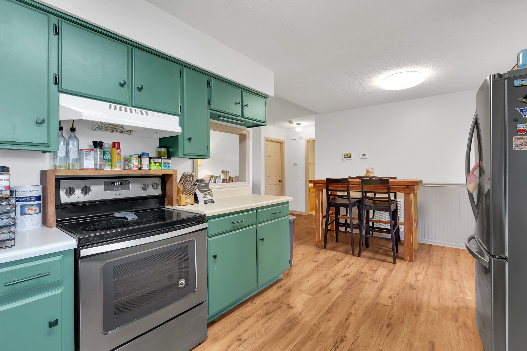 5363 Candy Cane Court Murfreesboro, TN 37129 - Photo 10 of 34 a kitchen with stainless steel appliances a stove a sink and a refrigerator