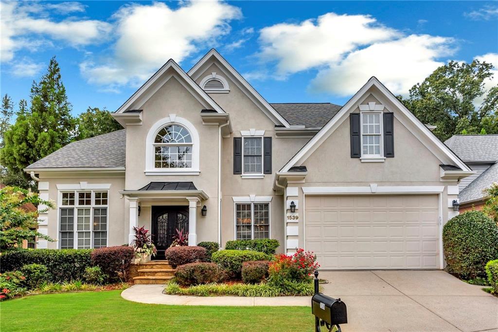 1539 Reserve Circle Decatur, GA 30033 - Photo 1 of 1 a front view of a house with garden