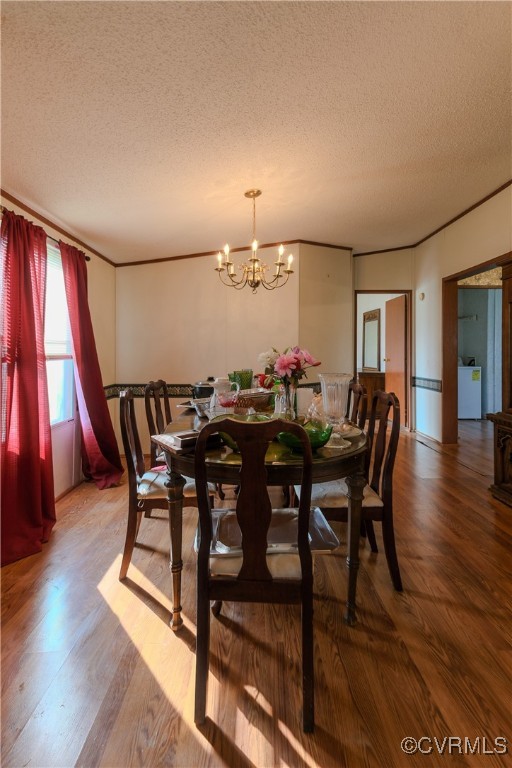 1455 Hendricks Road Pamplin, VA 23958 - Photo 19 of 37 Dining area featuring a textured ceiling, a chande