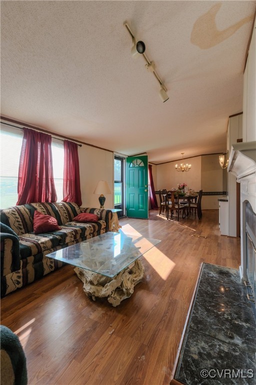 1455 Hendricks Road Pamplin, VA 23958 - Photo 22 of 37 Living area featuring wood finished floors, plenty