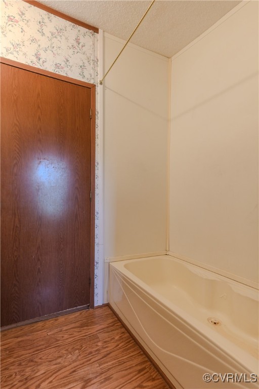 1455 Hendricks Road Pamplin, VA 23958 - Photo 27 of 37 Full bathroom featuring a textured ceiling, a tub