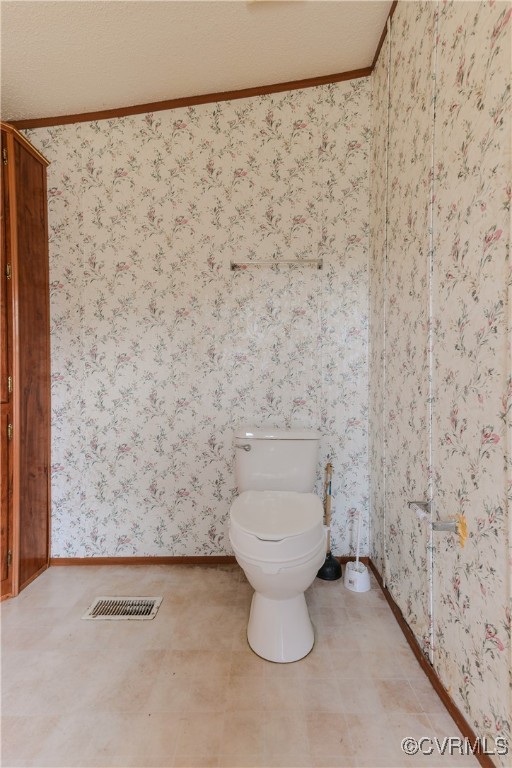 1455 Hendricks Road Pamplin, VA 23958 - Photo 33 of 37 Bathroom featuring a textured ceiling, tile patter