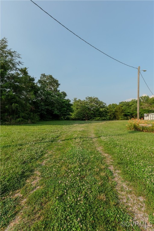 1455 Hendricks Road Pamplin, VA 23958 - Photo 10 of 37 View of green lawn with a view of trees