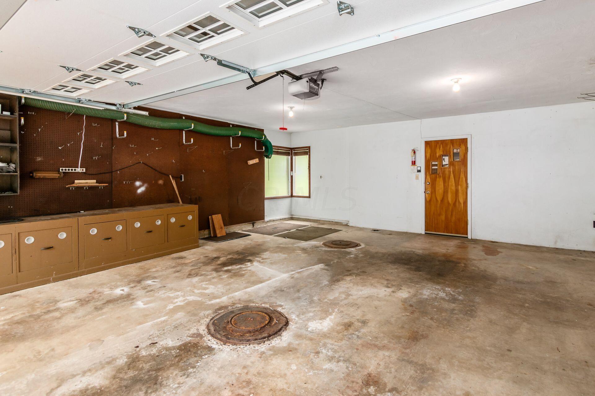 5901 Cooper Road Westerville, OH 43081 - Photo 38 of 46 Two abandoned cisterns in the garage area.