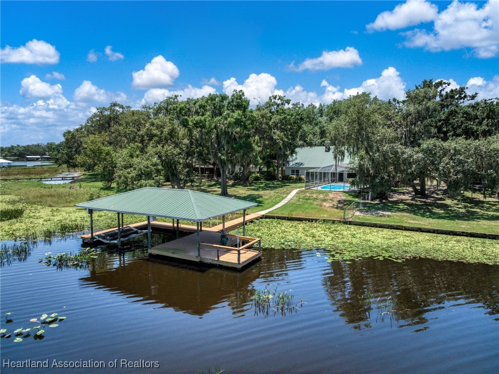 1630 Sentinel Road Sebring, FL 33875 - Photo 2 of 48 Bring your boats! Large dock and boathouse