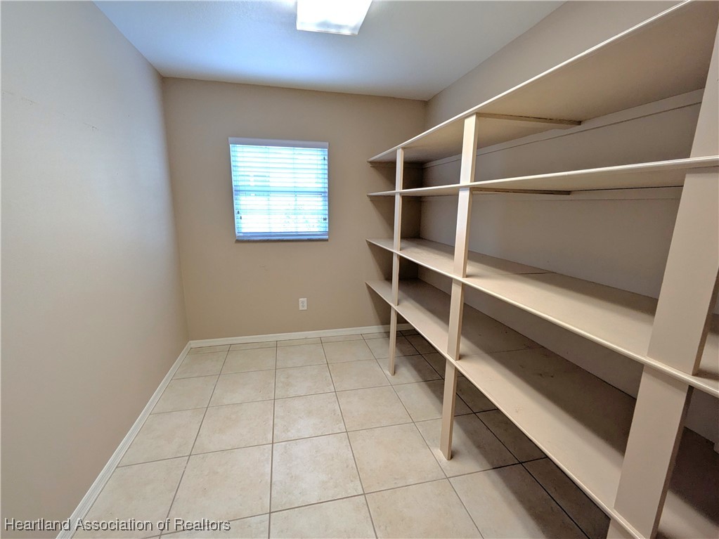 1630 Sentinel Road Sebring, FL 33875 - Photo 25 of 48 Big storage closet or could be used as a Butler's pantry