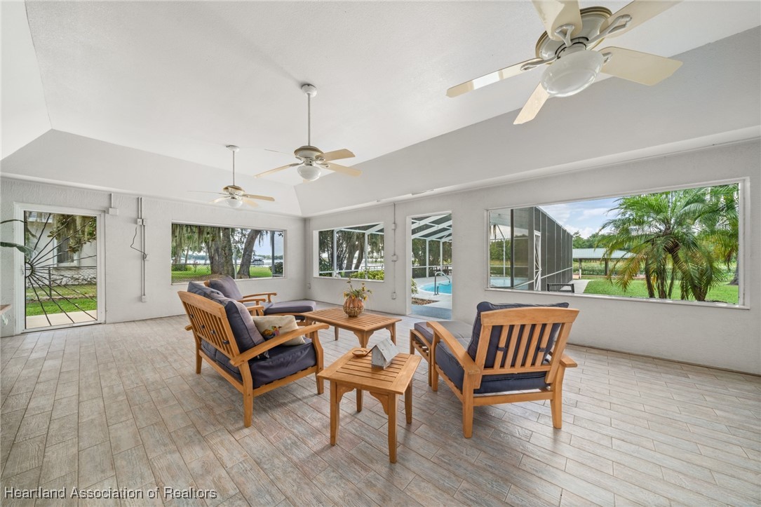 1630 Sentinel Road Sebring, FL 33875 - Photo 26 of 48 Soak in the lake views from the tiled porch