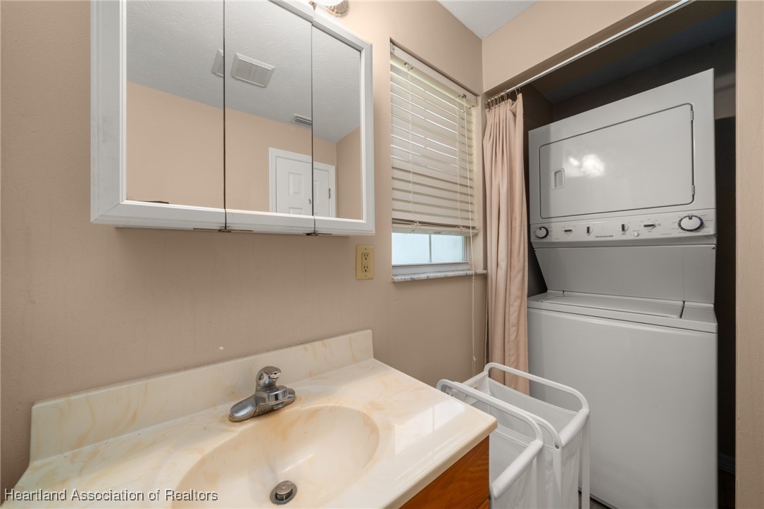 1630 Sentinel Road Sebring, FL 33875 - Photo 35 of 48 Stacked washer and dryer included in the apt