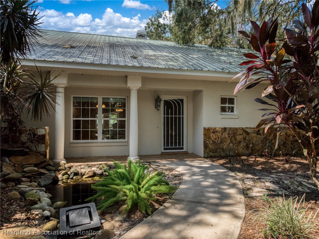 1630 Sentinel Road Sebring, FL 33875 - Photo 43 of 48 Charming front porch to main house