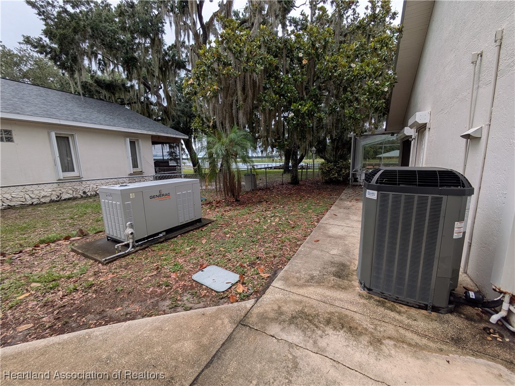 1630 Sentinel Road Sebring, FL 33875 - Photo 47 of 48 Generator for entire property! 2021 AC (main house)