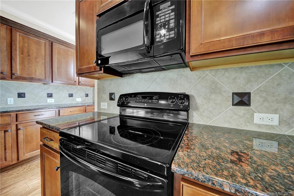 3550 Richard's Crossing Fort Mill, SC 29708 - Photo 11 of 33 a stove top oven sitting inside of a kitchen