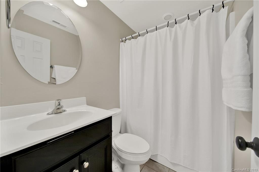3550 Richard's Crossing Fort Mill, SC 29708 - Photo 28 of 33 a bathroom with a sink and a mirror