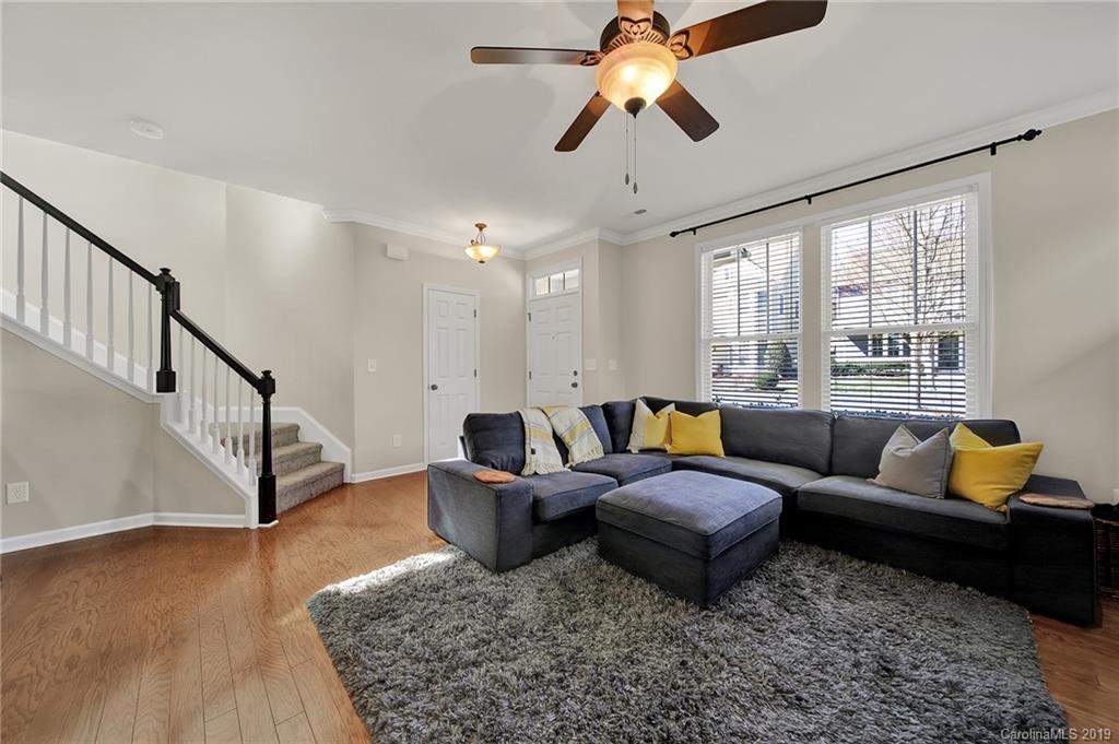 3550 Richard's Crossing Fort Mill, SC 29708 - Photo 6 of 33 a living room with furniture ceiling fan and a rug