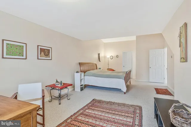 a bedroom with furniture and a couch