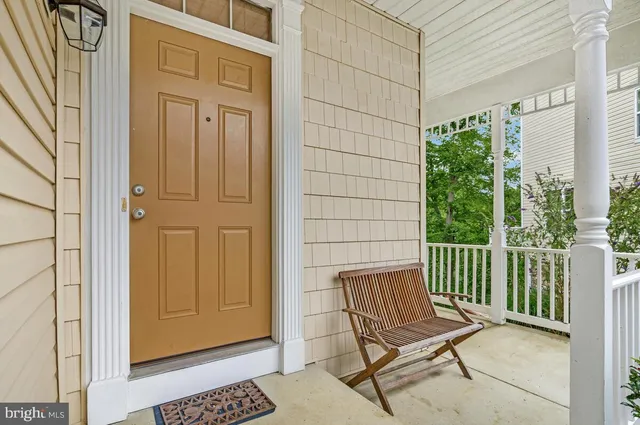 a view of a two chairs in the balcony