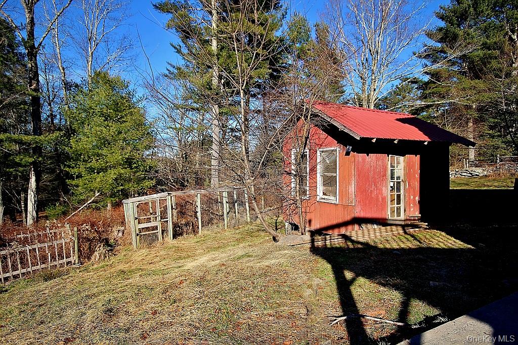 51 Forestburgh Road Forestburgh, NY 12777 - Photo 30 of 35 a backyard of a house with table and chairs