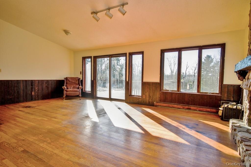 51 Forestburgh Road Forestburgh, NY 12777 - Photo 10 of 35 a view of livingroom with furniture wooden floor and windows