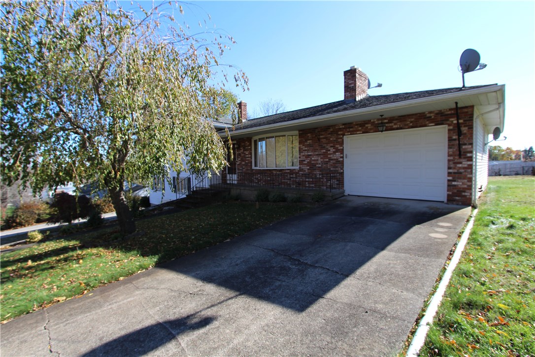 68 Rabbitt Hill Road Cumberland, RI 02864 - Photo 3 of 24 Street view left (Attached garage)