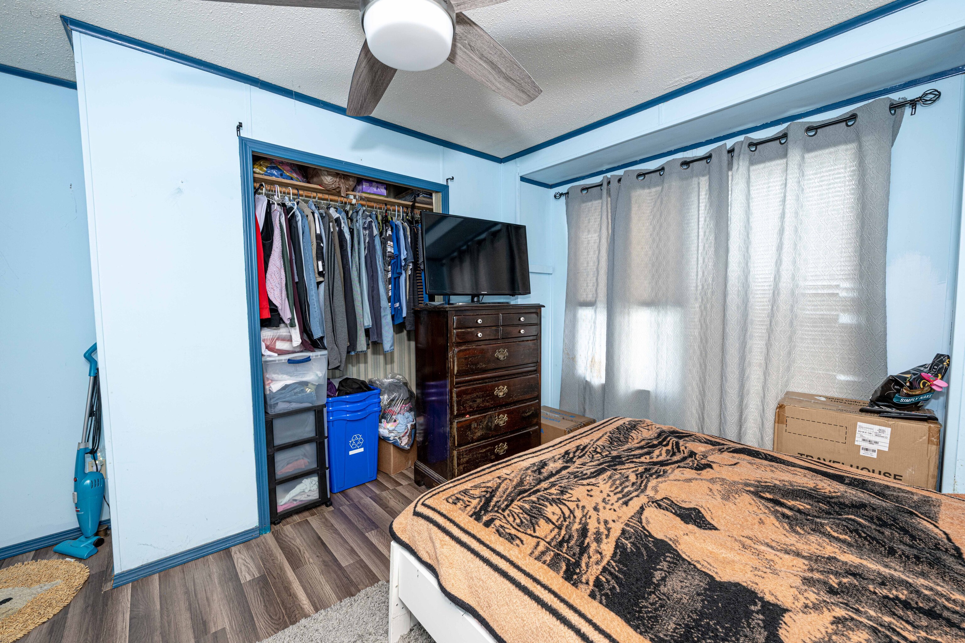 525 East Main Street Branford, CT 06405 - Photo 15 of 20 a bedroom with a bed and a closet