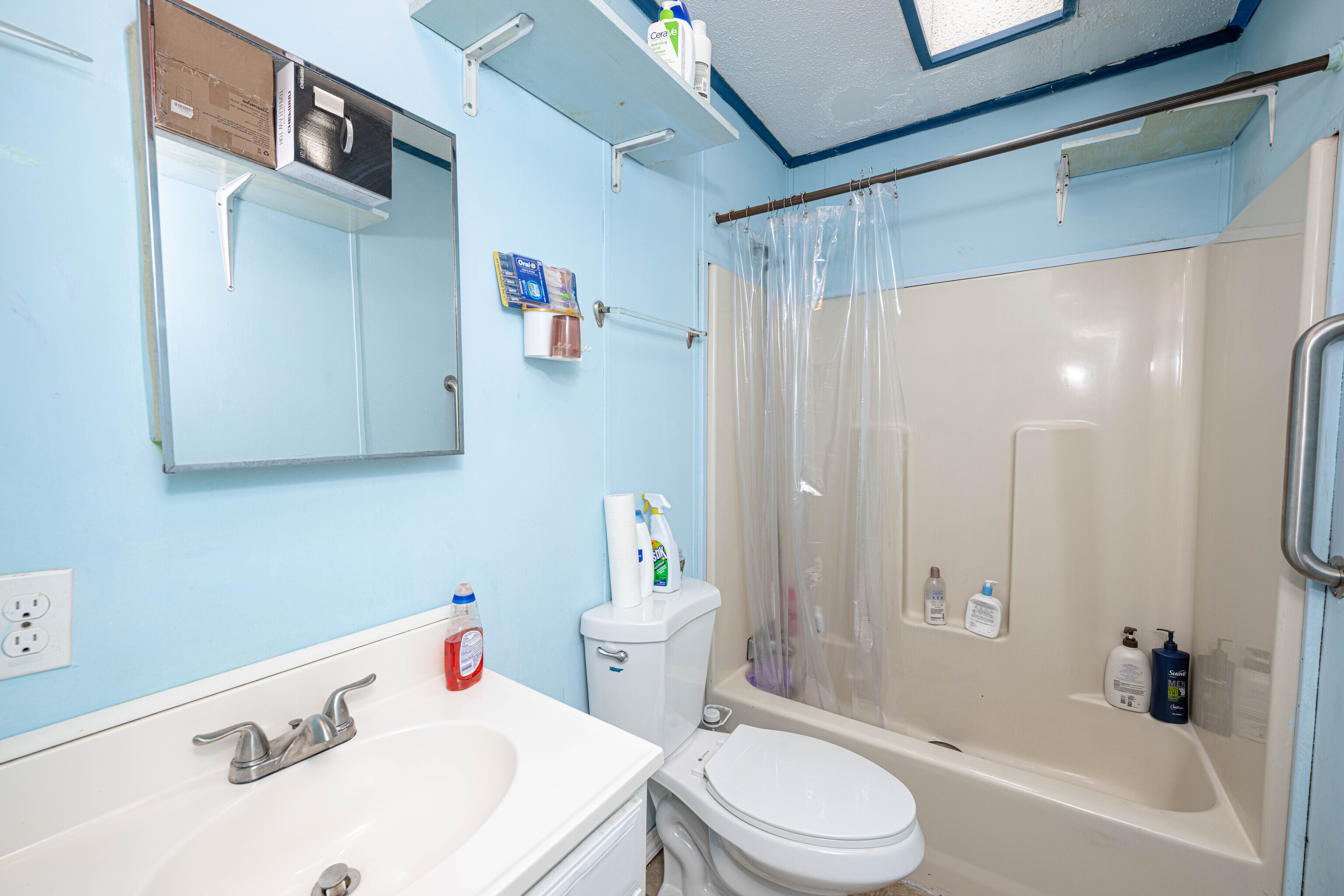 525 East Main Street Branford, CT 06405 - Photo 17 of 20 a bathroom with a sink toilet and shower