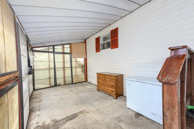 a view of backyard with a grill