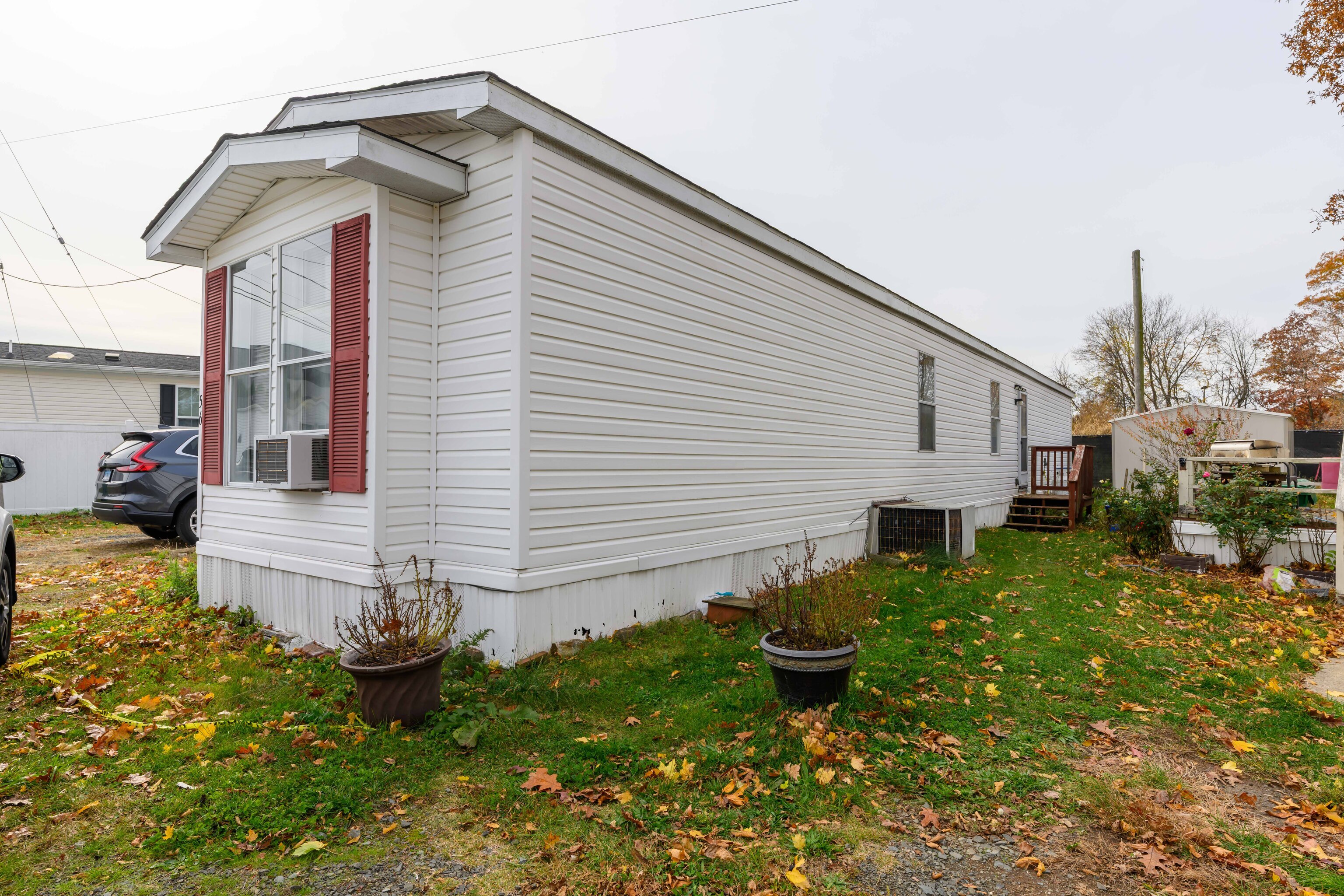 525 East Main Street Branford, CT 06405 - Photo 2 of 20 a front view of a house with garden