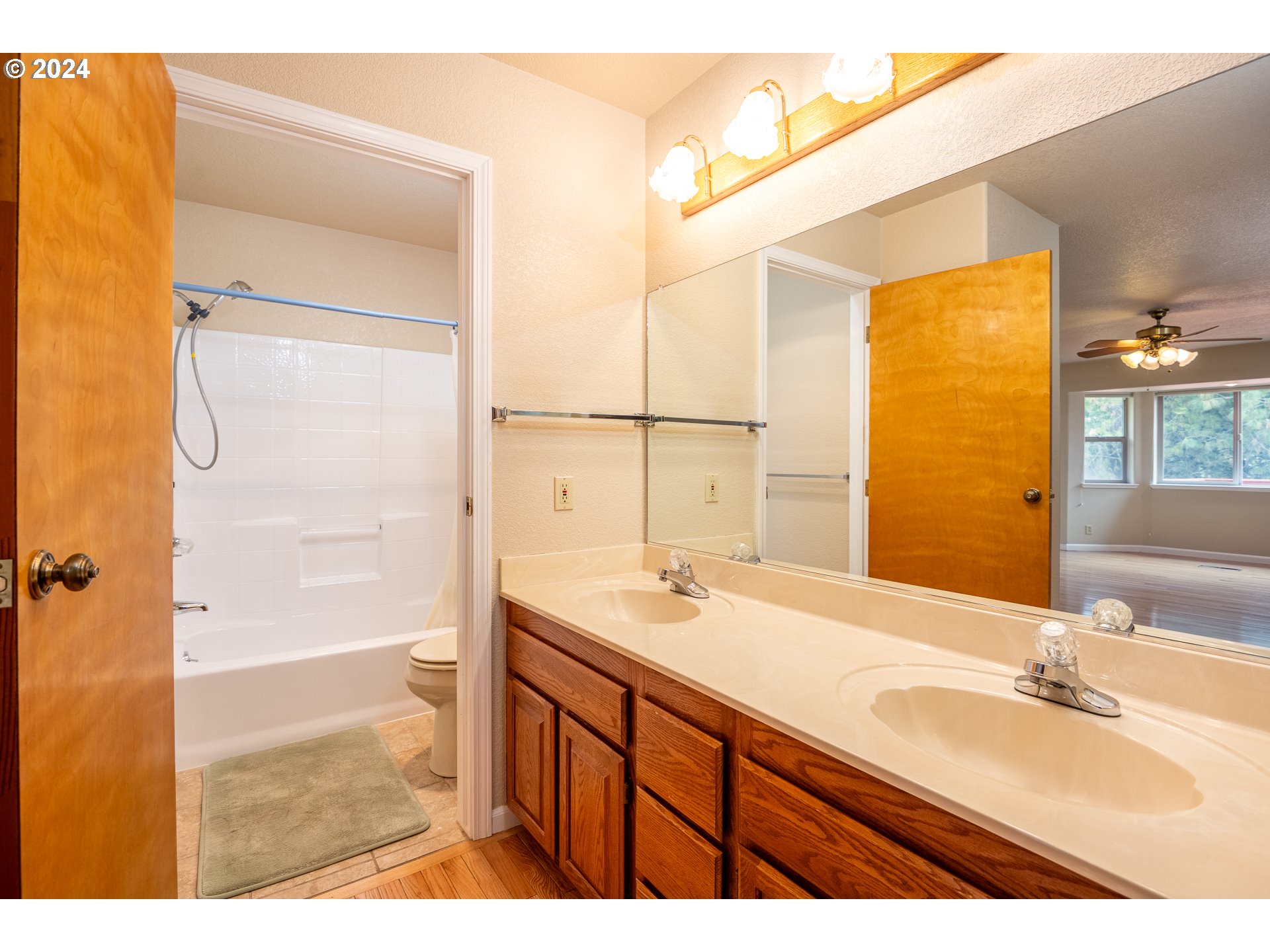 6600 Tunnel Loop Road Grants Pass, OR 97526 - Photo 23 of 43 a bathroom with a sink double vanity and a mirror