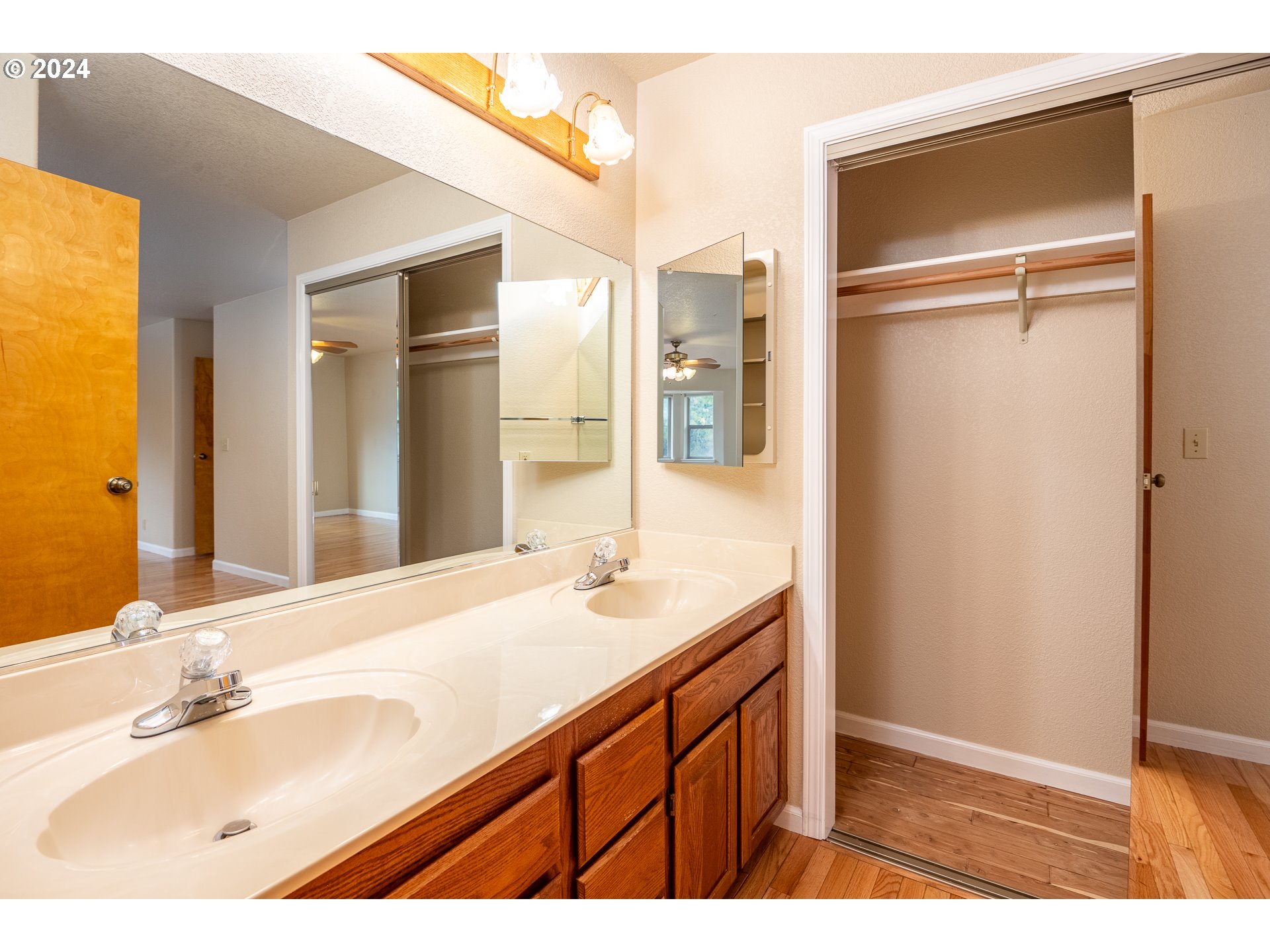6600 Tunnel Loop Road Grants Pass, OR 97526 - Photo 24 of 43 a bathroom with a sink double vanity and a mirror