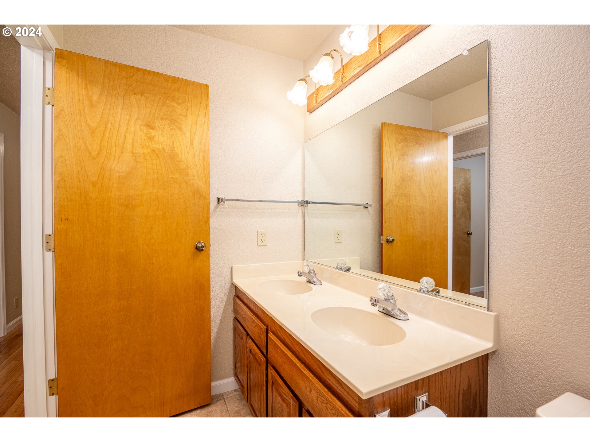 6600 Tunnel Loop Road Grants Pass, OR 97526 - Photo 28 of 43 a bathroom with a sink and a mirror