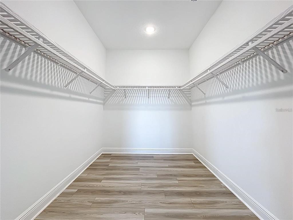 3951 Kennebunk Loop Mount Dora, FL 32757 - Photo 36 of 54 a view of a room with racks on the wall