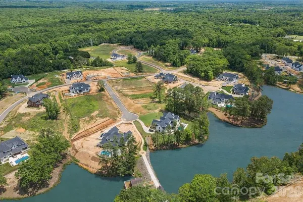 an aerial view of residential house with outdoor space