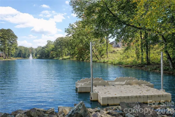 a wooden bridge near lake