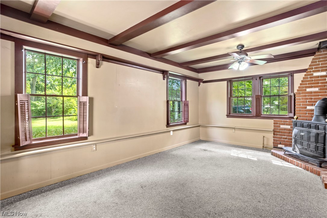 1920 Grafton Road Elyria, OH 44035 - Photo 13 of 35 Lots of windows and a beamed ceiling in the family room