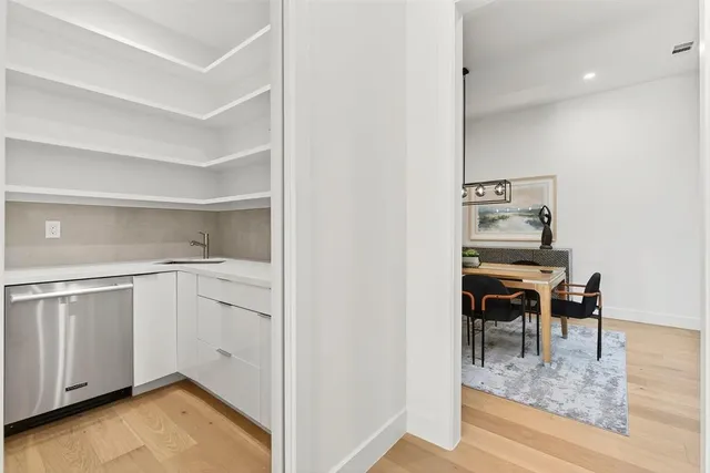 a bathroom with a bathtub and shower