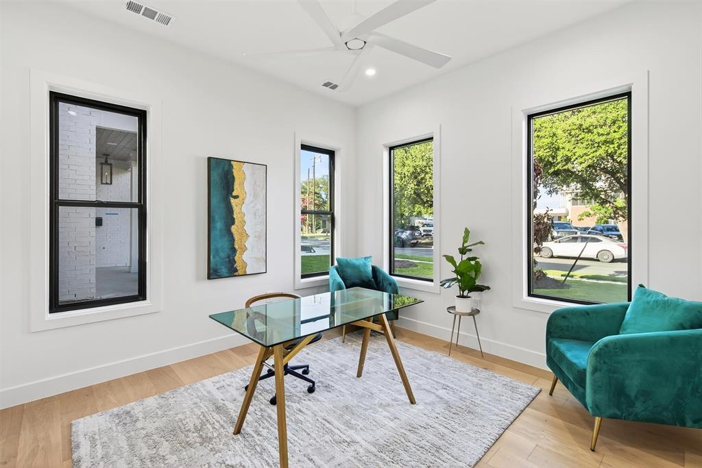7619 Robin Road Dallas, TX 75209 - Photo 21 of 40 a living room with furniture and a window