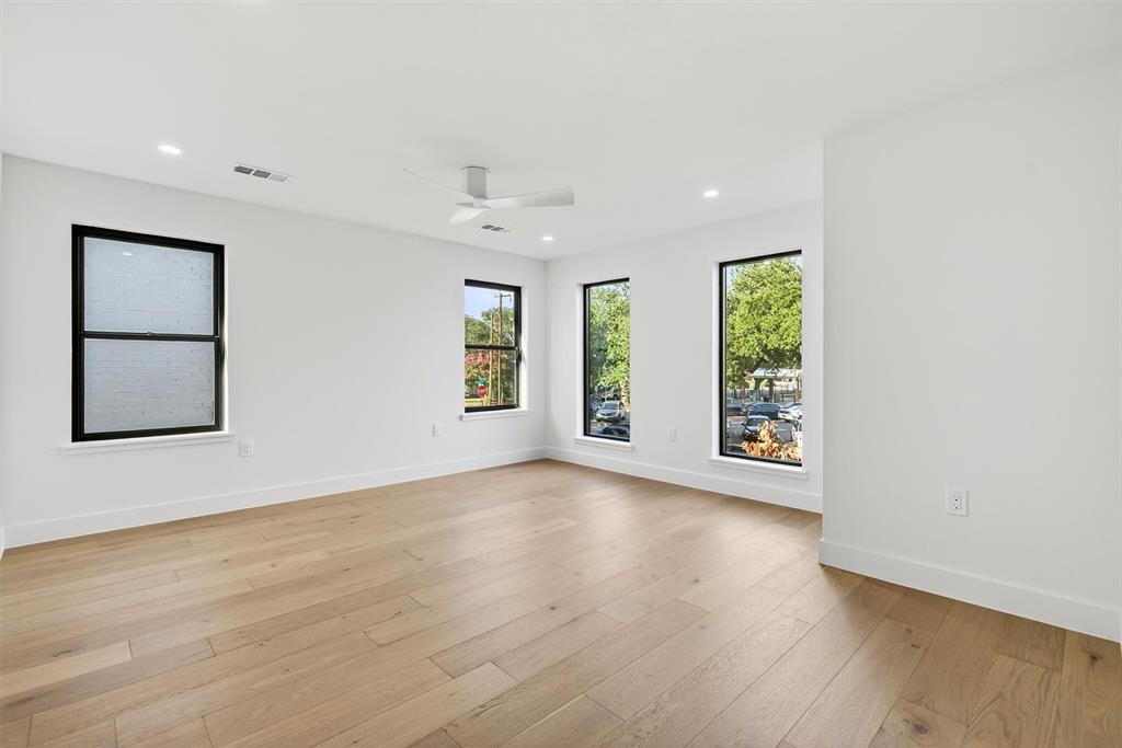 7619 Robin Road Dallas, TX 75209 - Photo 28 of 40 wooden floor in an empty room with a window