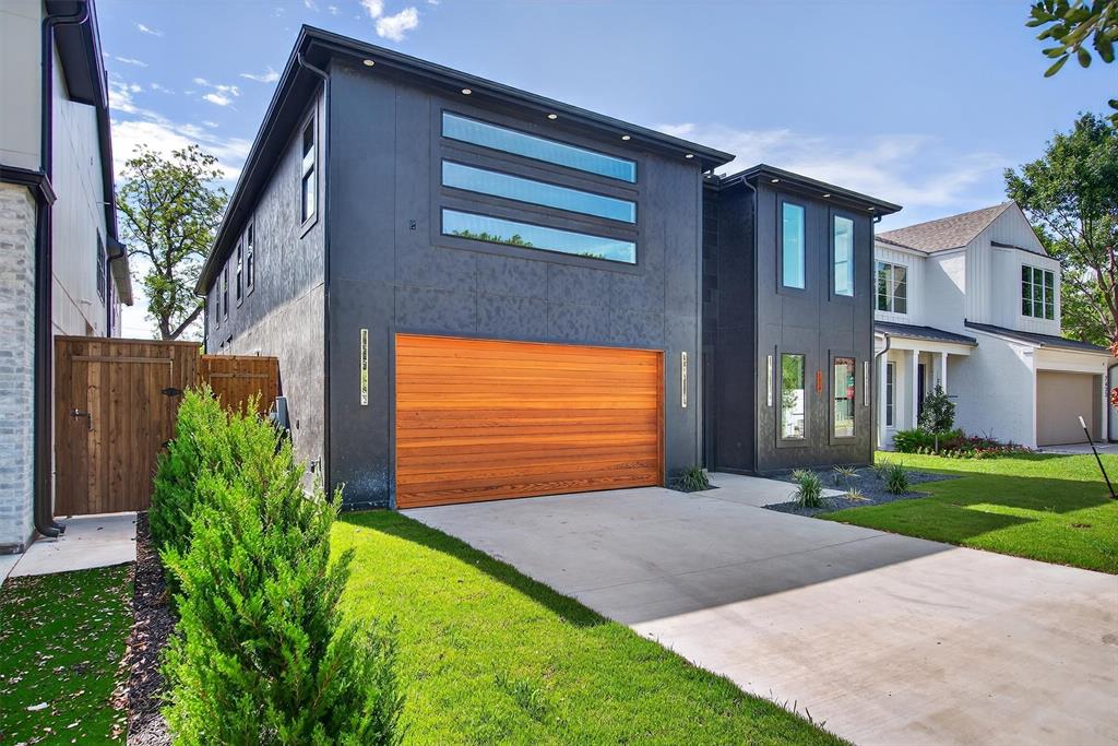 7619 Robin Road Dallas, TX 75209 - Photo 8 of 40 a view of a house with a small yard and a garden