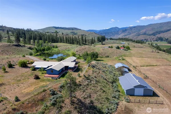 an aerial view of a house with a garden