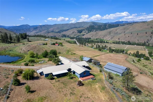 an aerial view of a house with a garden