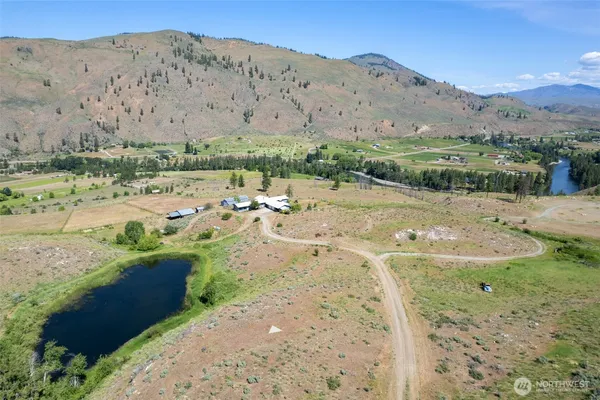 a view of a yard with a mountain