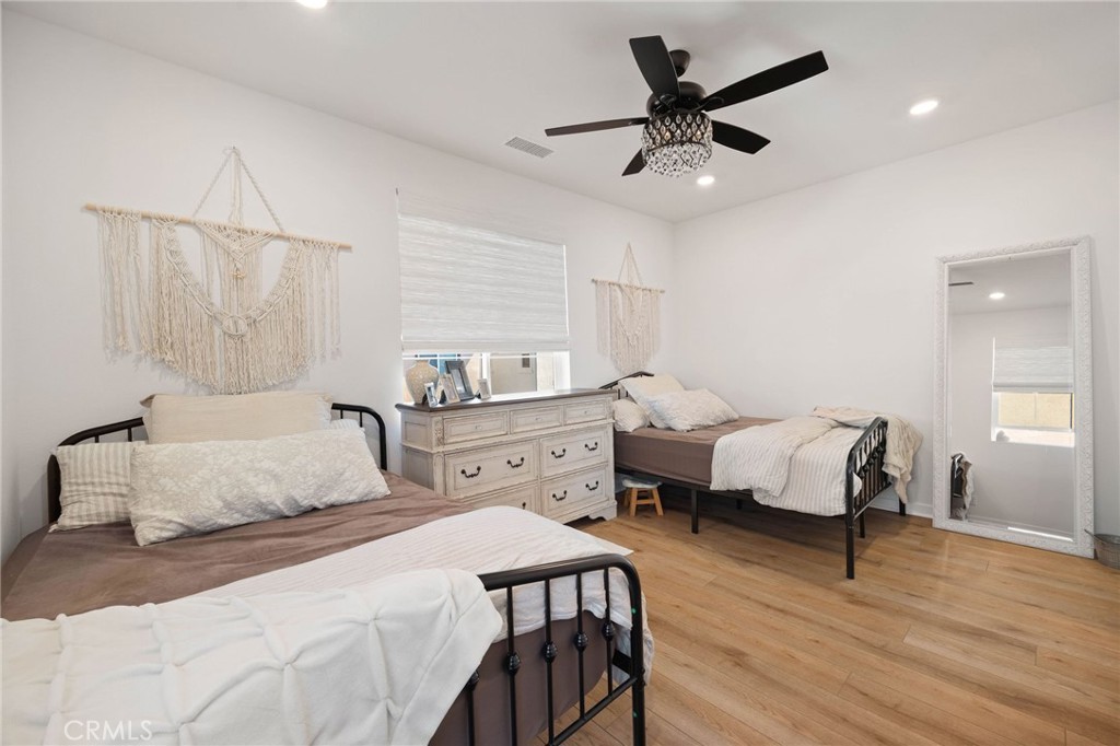 840 Barrel Way Rancho Mission Viejo, CA 92694 - Photo 14 of 57 a bedroom with a bed and wooden floor