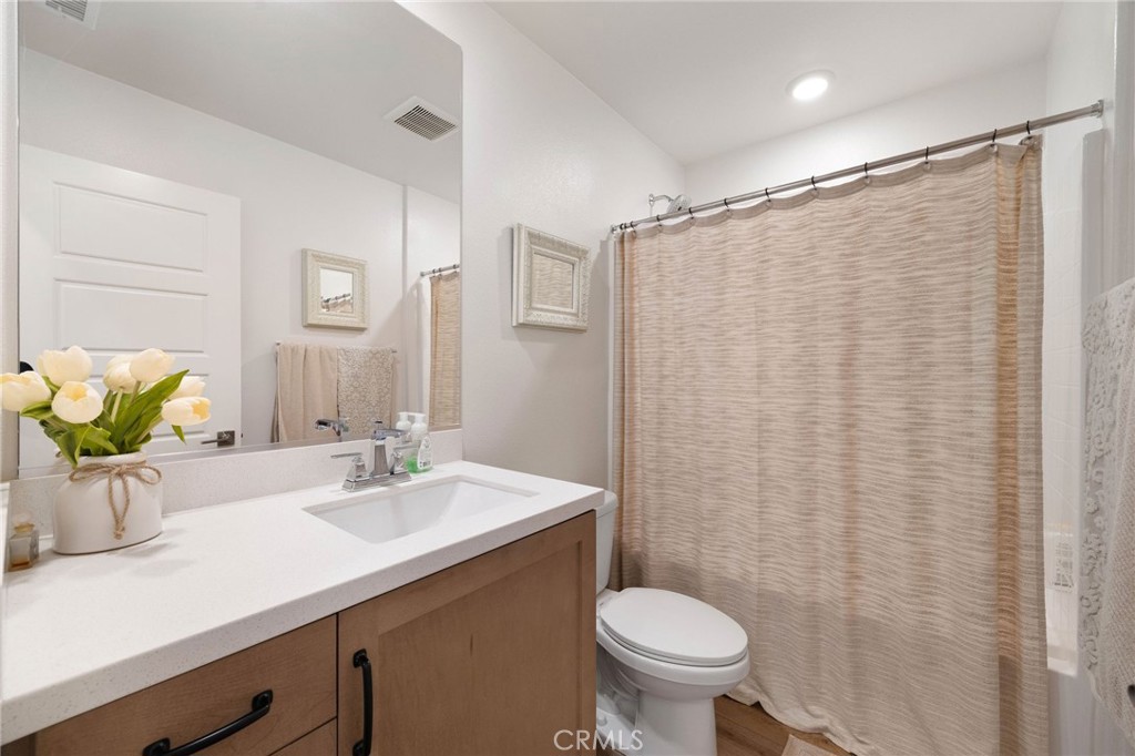 840 Barrel Way Rancho Mission Viejo, CA 92694 - Photo 15 of 57 a bathroom with a sink toilet and shower
