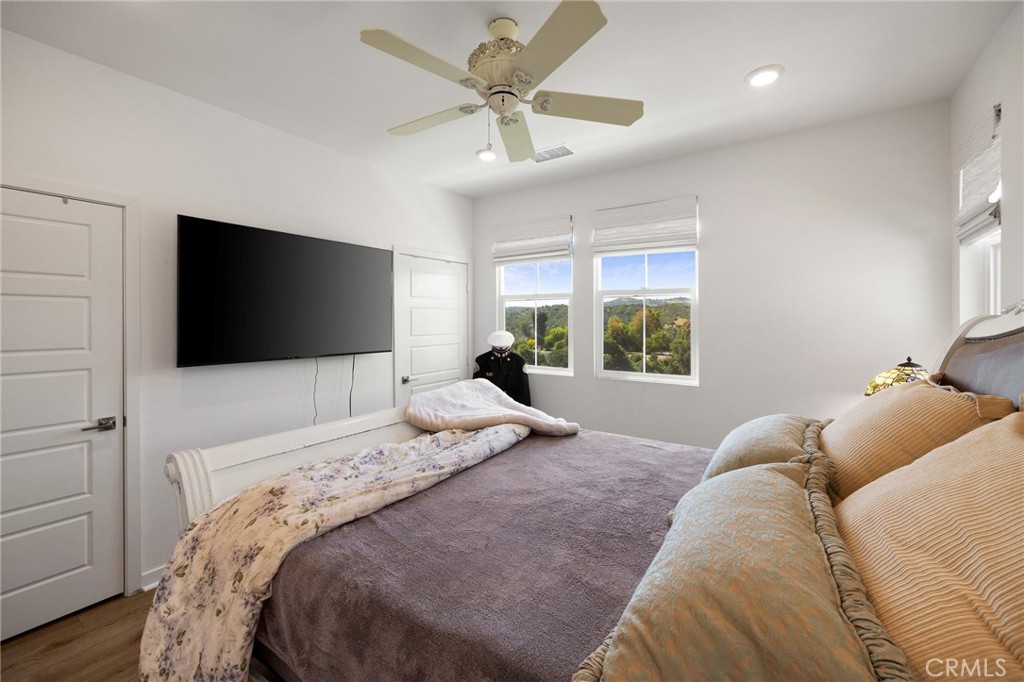 840 Barrel Way Rancho Mission Viejo, CA 92694 - Photo 17 of 57 a bedroom with a bed and a flat screen tv
