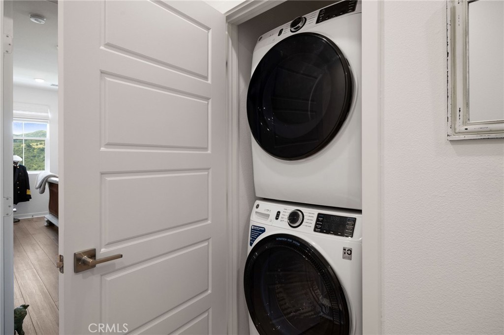 840 Barrel Way Rancho Mission Viejo, CA 92694 - Photo 20 of 57 a view of a hallway with washer and dryer