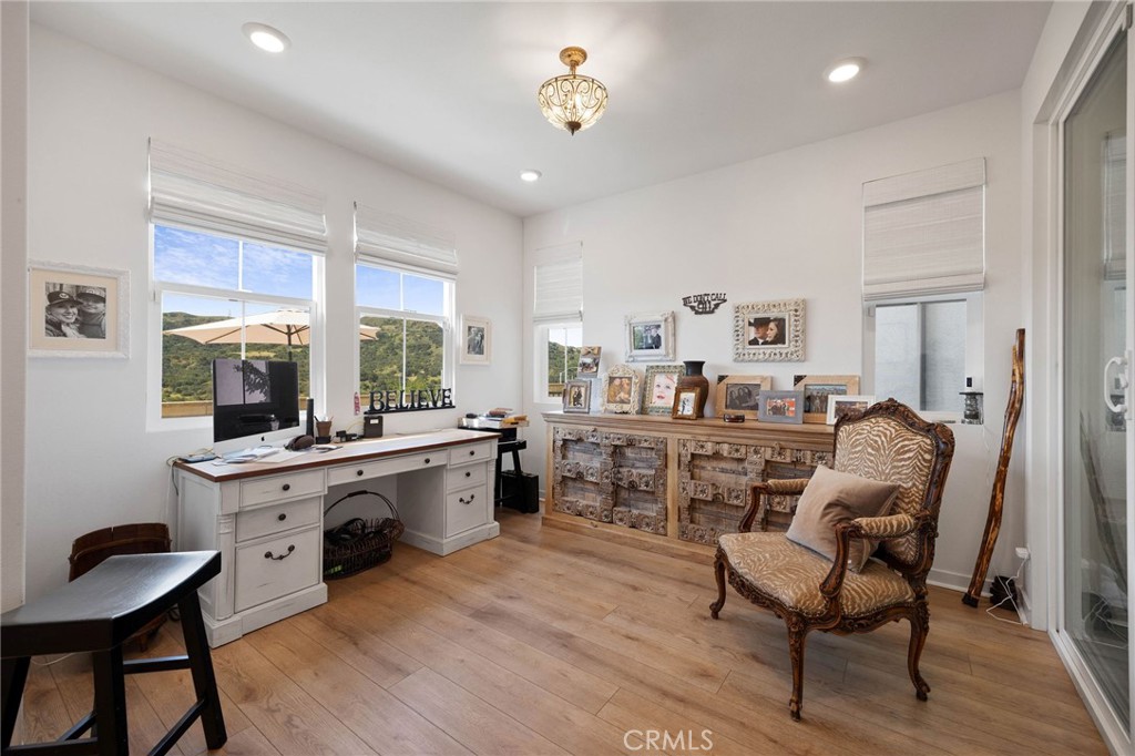 840 Barrel Way Rancho Mission Viejo, CA 92694 - Photo 22 of 57 a room with dining table and chairs