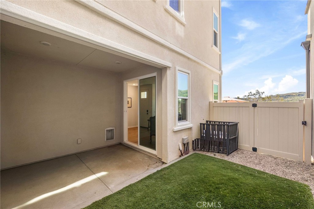 840 Barrel Way Rancho Mission Viejo, CA 92694 - Photo 25 of 57 a view of a house with backyard porch and furniture