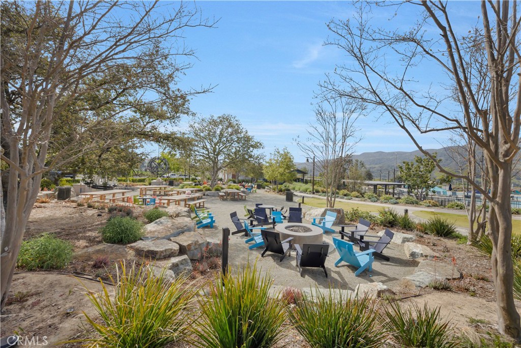 840 Barrel Way Rancho Mission Viejo, CA 92694 - Photo 44 of 57 a view of a lake with couches and chairs