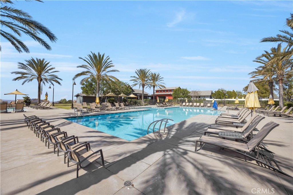 840 Barrel Way Rancho Mission Viejo, CA 92694 - Photo 47 of 57 a view of a swimming pool with lounge chair