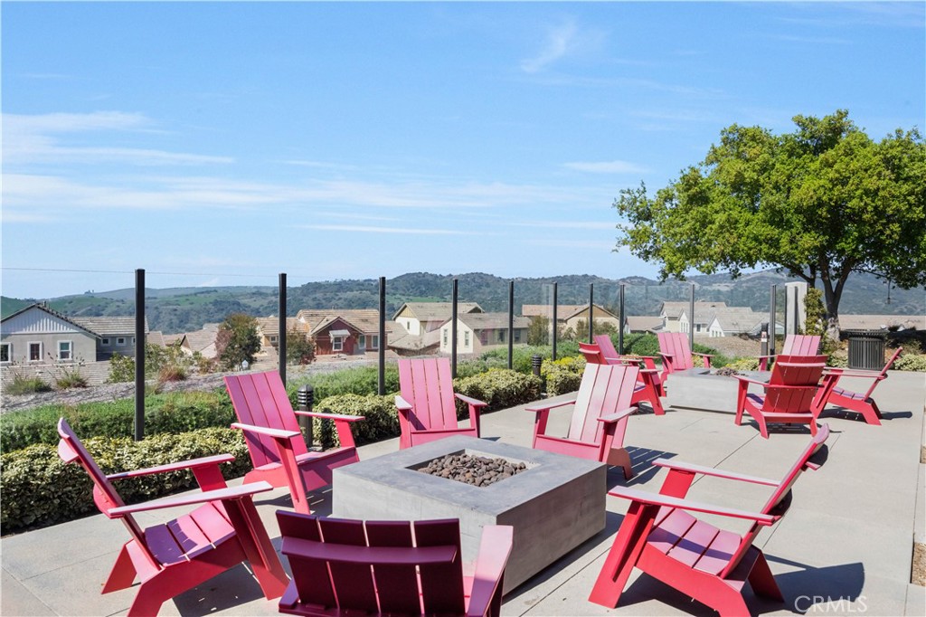 840 Barrel Way Rancho Mission Viejo, CA 92694 - Photo 50 of 57 a view of a patio with table and chairs and potted plants