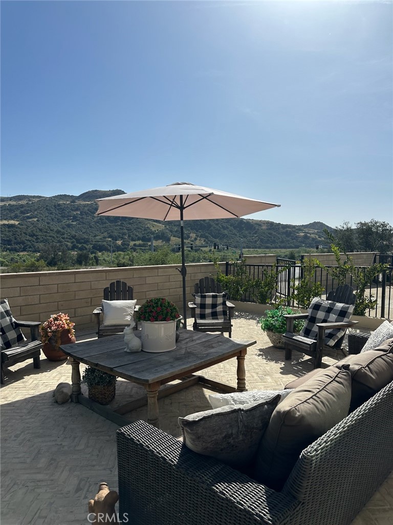 840 Barrel Way Rancho Mission Viejo, CA 92694 - Photo 5 of 57 a terrace view with seating space